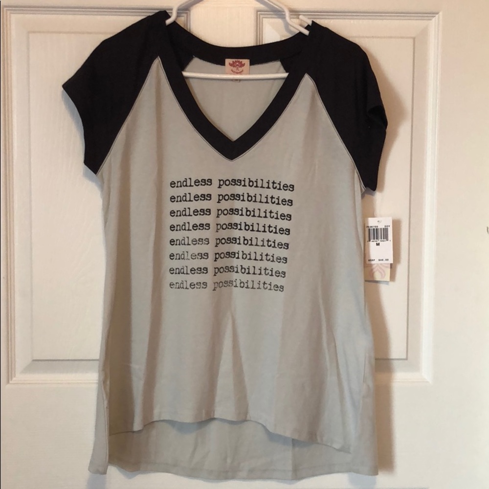 Women’s Pink Lotus Graphic Top Medium.